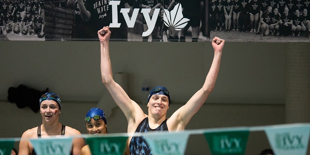 University of Pennsylvania swimmer Lia Thomas reacts after her team wins the 400 yard freestyle relay during the 2022 Ivy League Womens Swimming and Diving Championships at Blodgett Pool on February 19, 2022, in Cambridge, Massachusetts.