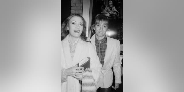 Olivia Newton-John with Jane Seymour outside a theater, circa 1970