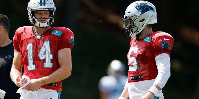 Sam Darnold (14) and Baker Mayfield (6) of the Carolina Panthers during training camp at Wofford College Aug. 2, 2022, Spartanburg, S.C.