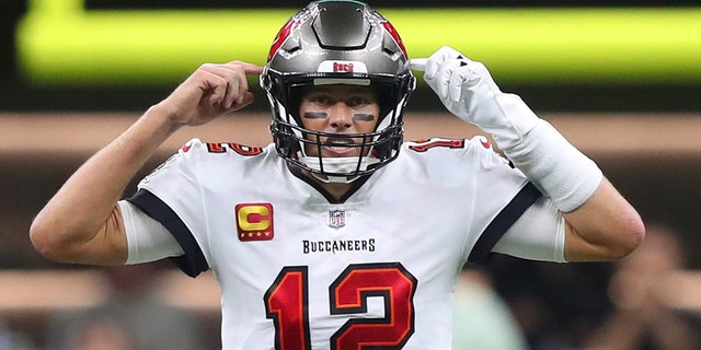 Tampa Bay Buccaneers quarterback Tom Brady signals his teammates during the game against the New Orleans Saints at Caesars Superdome in New Orleans on Sept. 18, 2022.