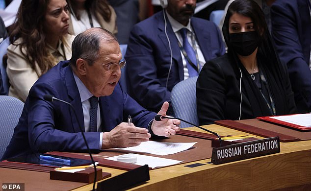 Lavrov pictured speaking at the Security Council meeting in New York, accused the West of 'covering up the crimes of the Kyiv regime'