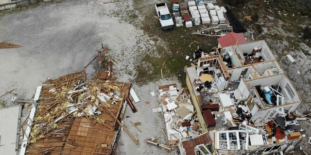 A damaged business is seen in the aftermath of Hurricane Sally, Thursday, Sept. 17, 2020, in Perdido Key, Fla.  (AP Photo/Angie Wang)