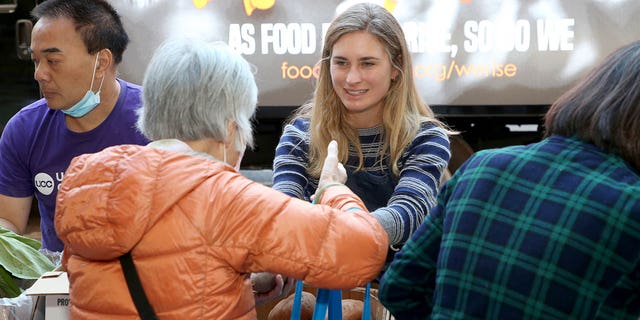 Lauren Bush Lauren, CEO and co-founder of FEED Projects (in striped shirt) on Friday, Sept. 23, 2022, as leaders of Feeding America, City Harvest and Food Bank for New York City shared comments about hunger in America at Urban Outreach Center in New York City. 