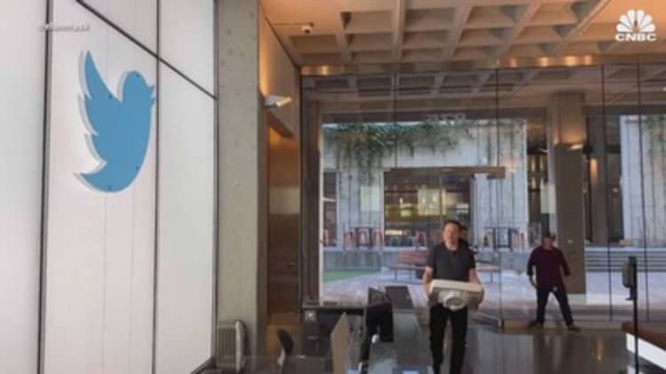 Billionaire Elon Musk steps into Twitter HQ, sink in hand
