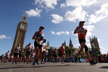 Runner, 36, dies after collapsing just 2 miles from end of London Marathon