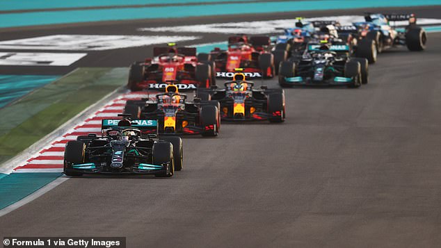 Lewis Hamilton (front) was controversially pipped to the title last season by Verstappen
