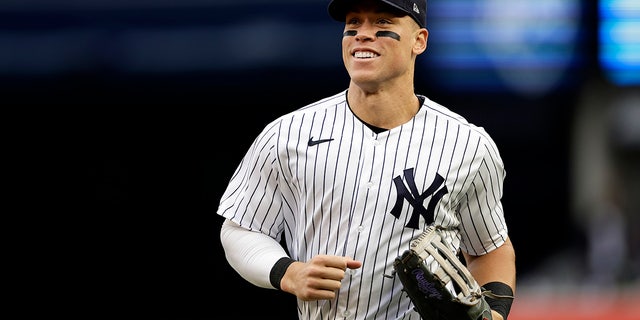 New York Yankees right fielder Aaron Judge runs to the dugout during the sixth inning of the team's baseball game against the Baltimore Orioles on Saturday, Oct. 1, 2022, in New York. 