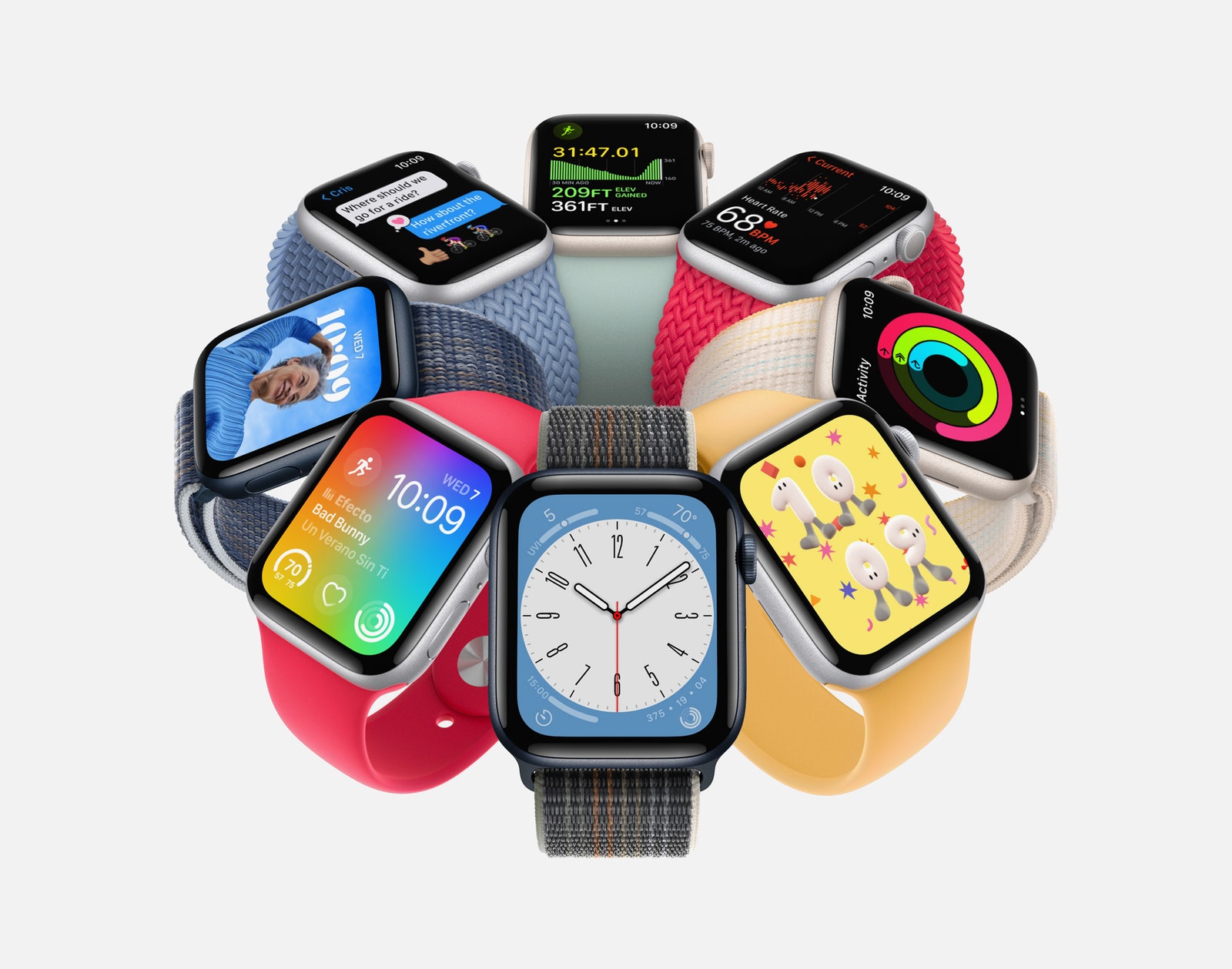 Apple Watch Series 8 models in different colored bands displaying different watch faces