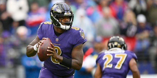 Baltimore Ravens quarterback Lamar Jackson looks for a receiver in the first half of an NFL football game against the Buffalo Bills Sunday, Oct. 2, 2022, in Baltimore. 