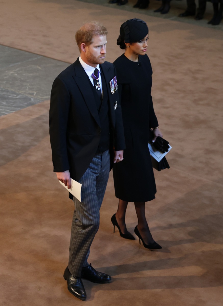 Prince Harry and Meghan Markle attend as the coffin of Queen Elizabeth II is escorted into Westminster Hall for the lying-in state