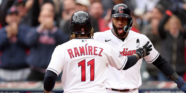 Jose Ramirez (11) of the Cleveland Guardians celebrates with Amed Rosario after hitting a two-run home run in the sixth inning against the Tampa Bay Rays during Game 1 of a Wild Card Series at Progressive Field Oct. 7, 2022 in Cleveland.