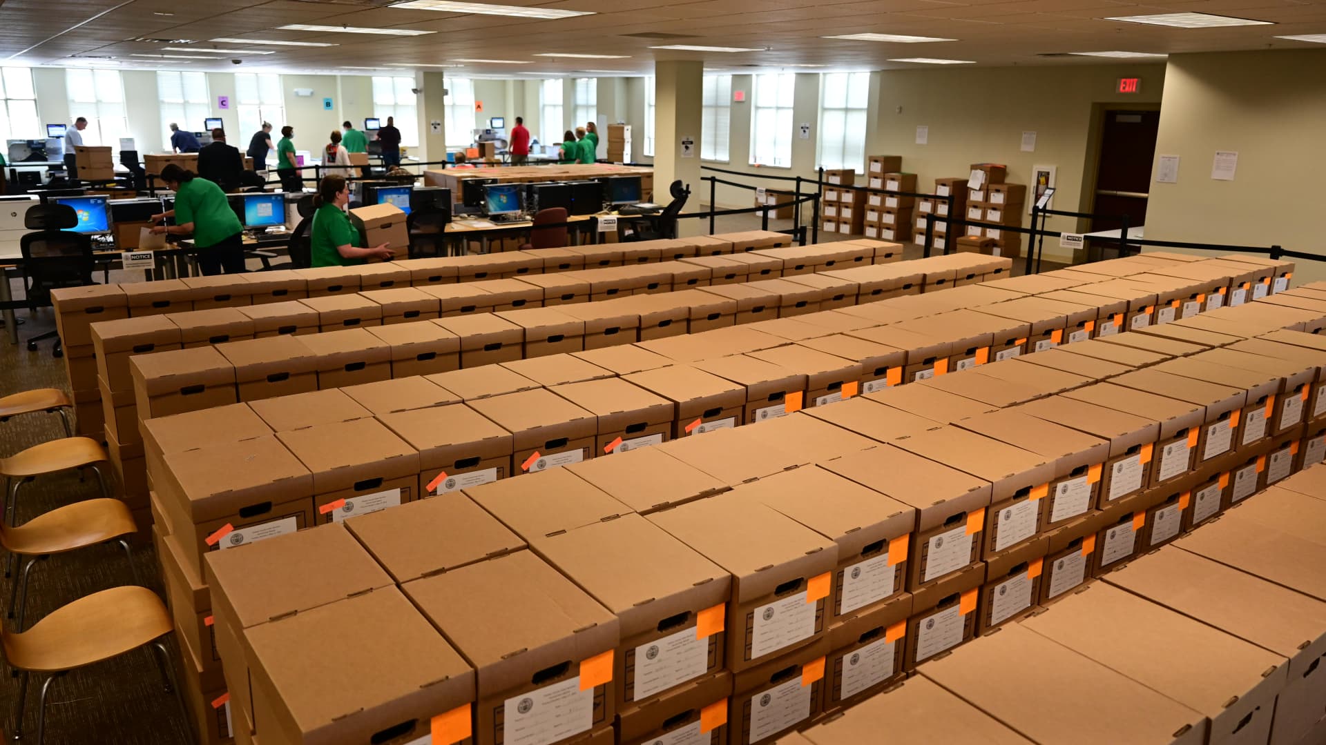 Boxes of ballots are stacked as county officials perform a ballot recount on June 2, 2022 in West Chester, Pennsylvania. With less than 1,000 votes separating Republican U.S. Senate candidates Dr. Mehmet Oz and David McCormick, a state wide recount has begun in the too-close-to-call Republican primary contest in Pennsylvania.