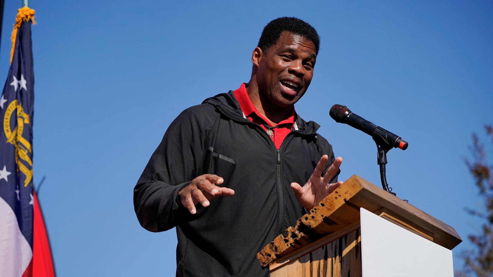 U.S. Senate candidate and former football player Herschel Walker speaks at the University of Georgia during his campaign rally in Americus, Georgia, October 21, 2022.