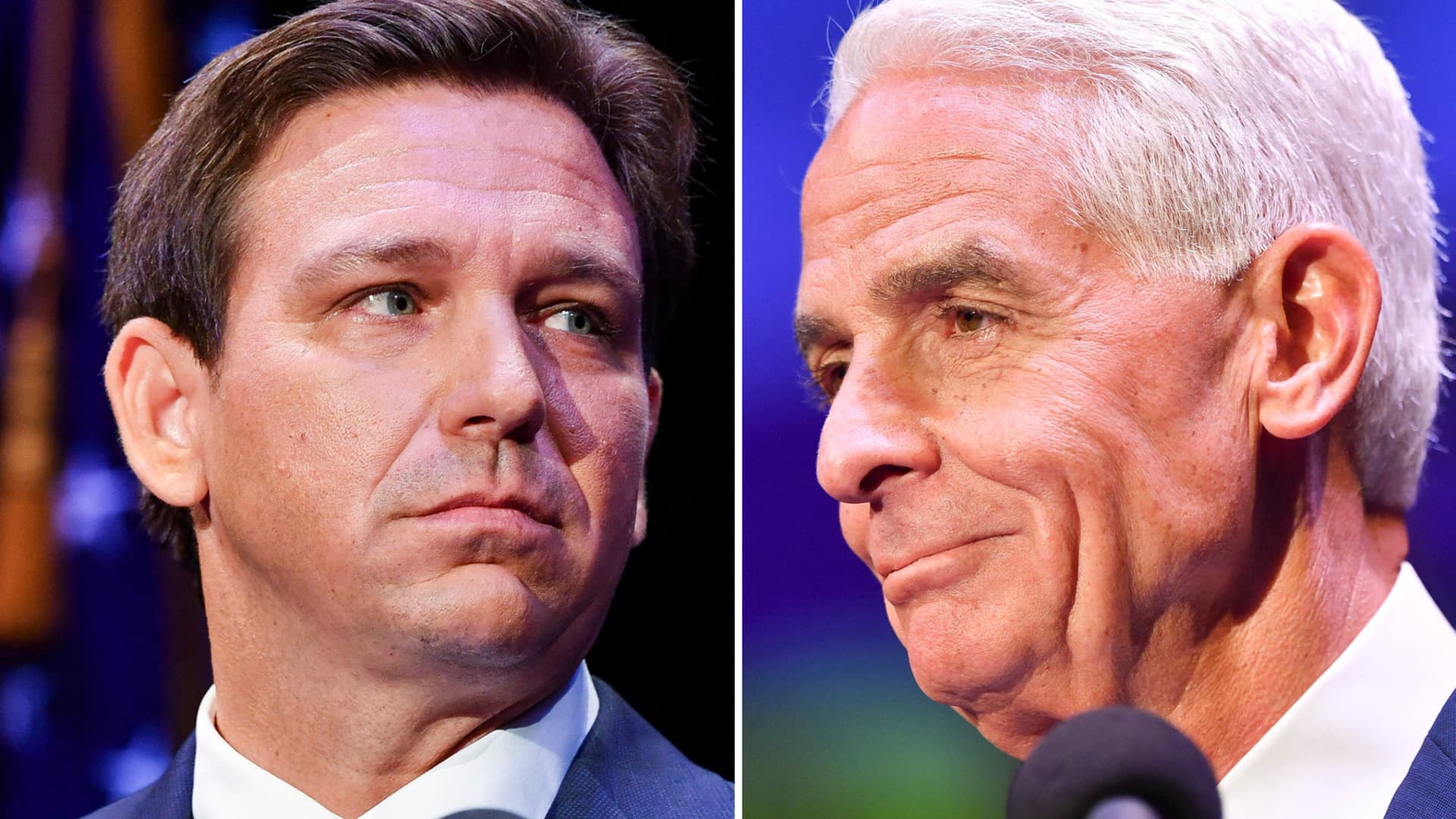 Florida's Republican incumbent Gov. Ron DeSantis takes to the stage opposite his Democratic Party challenger Charlie Crist, a former governor, at the Sunrise Theatre in Fort Pierce, Florida, U.S. October 24, 2022.