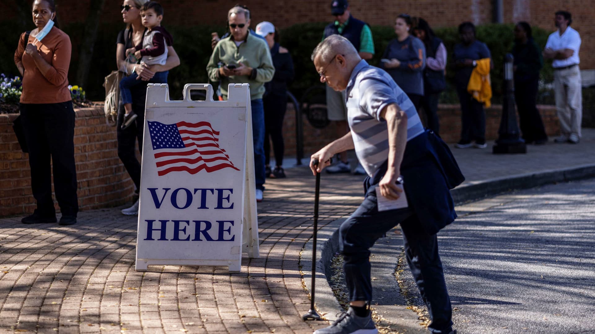 A man arrives to cast his ballot during early voting for the midterm elections at the Smyrna Community Center in Smyrna, Georgia, November 4, 2022.