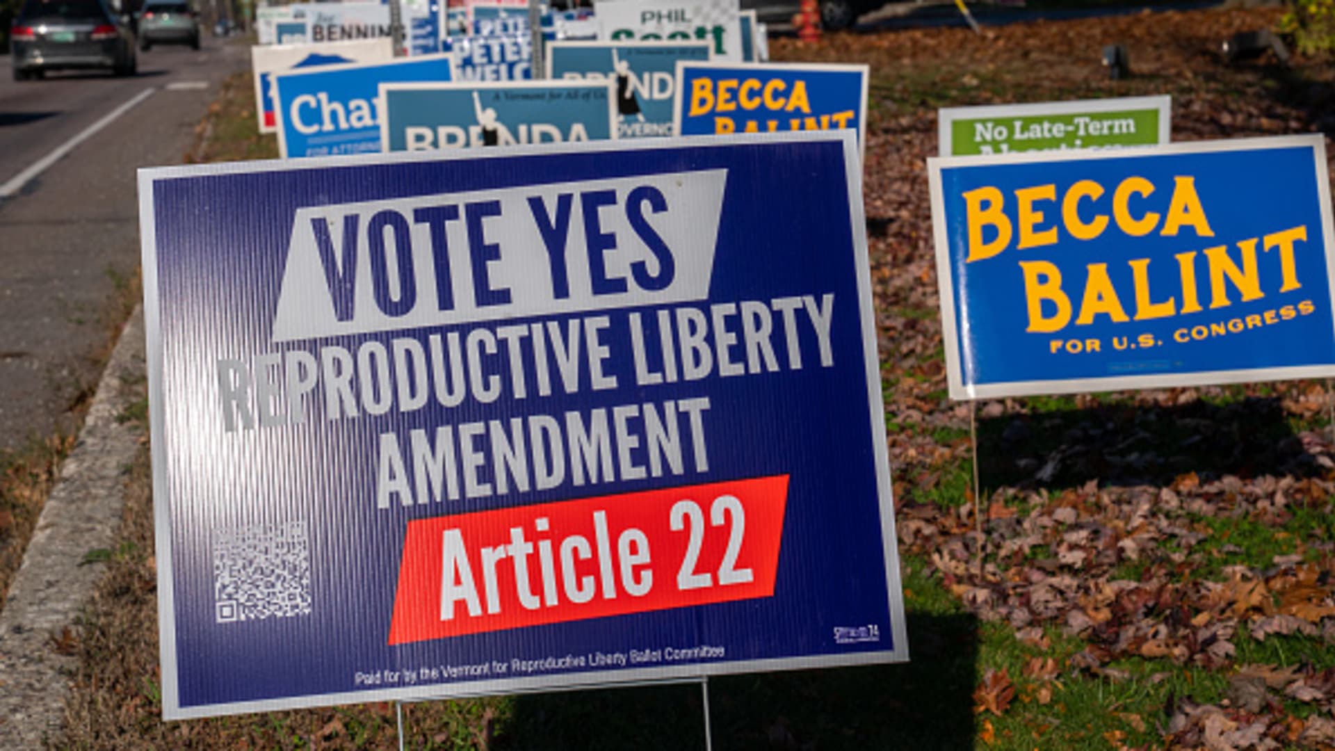 Political candidate and referendum posters are placed along a main road November 2, 2022 in Shelburne, Vermont. A sign in favor Article 27 would enshrine a woman's reproductive rights in the Vermont state constitution following the US Supreme Court's declaring Roe v. Wade as unconstitutional after 50 years of abortion rights. US midterm elections will be held on November 8, 2022.