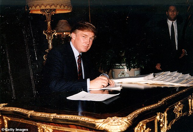 Carroll says Trump raped her in the dressing room of a Manhattan luxury department store in 1995 or 1996. Trump is pictured at his Mar-a-Lago estate, Palm Beach, Florida in 1995