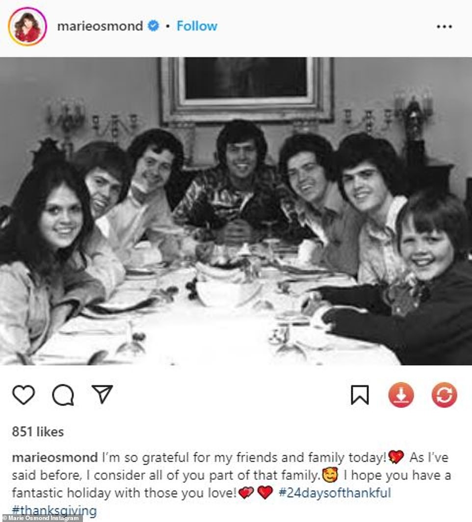 Home time: Singer Marie Osmond posed with her family as she said she was grateful