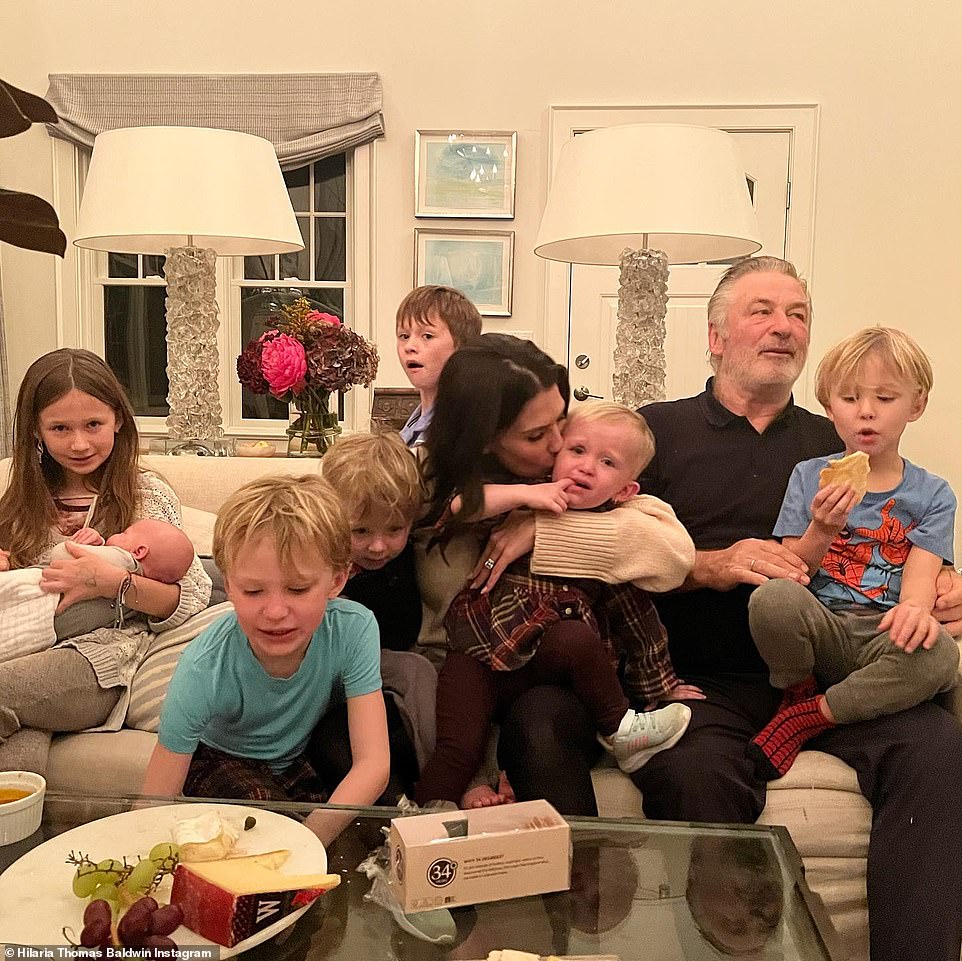 A cheese plate for fun: Alec Baldwin was with his wife Hilaria and their seven children as Carmen held a baby
