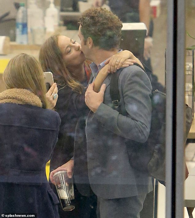 Danny Masterson, 46, shared a kiss with wife Bijou Phillips, 42, as the former 'That ´70s Show' star waited for a verdict in his rape trial after the deadlocked jury was forced to start over