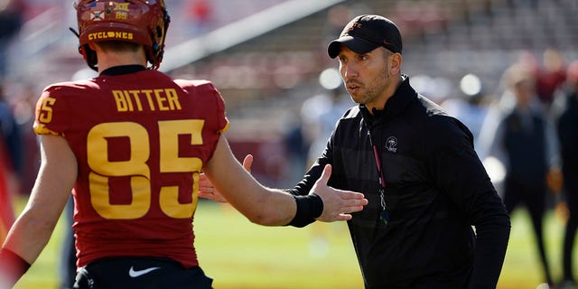 Head coach Matt Campbell of the Iowa State Cyclones shakes hands with wide receiver Aidan Bitter (85) in pregame warmups at Jack Trice Stadium Nov. 5, 2022, in Ames, Iowa.
