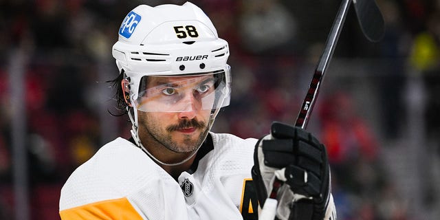 Pittsburgh Penguins defenseman Kris Letang looks on during a game against the Montreal Canadiens at Bell Centre in Montreal, Quebec, on Nov. 12, 2022.