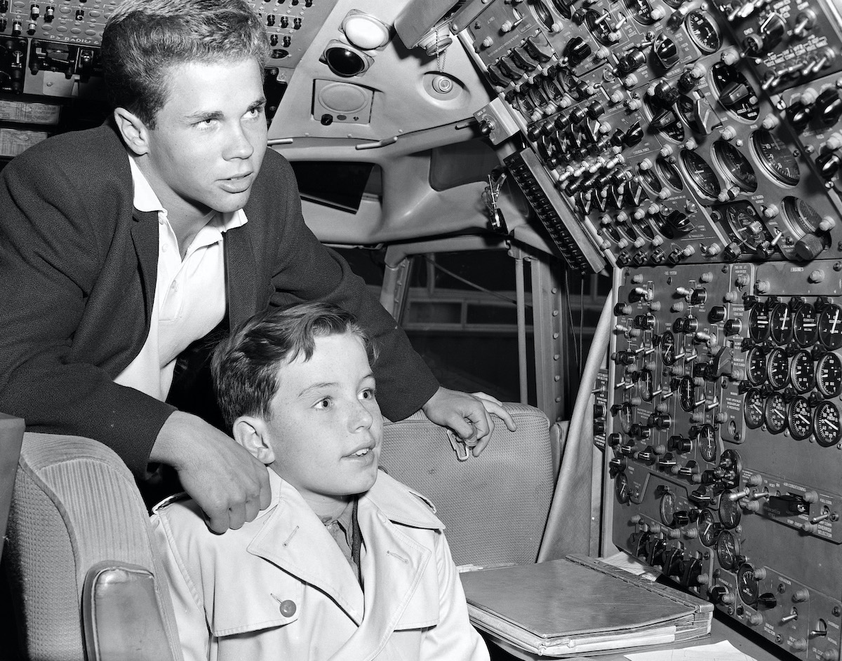 Tony Dow and Jerry Mathers of 'Leave It to Beaver' in the cockpit of a plane