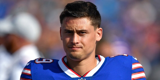 Buffalo Bills punter Matt Araiza walks on the sideline during a preseason game against the Indianapolis Colts in Orchard Park, New York, on Aug. 13, 2022.