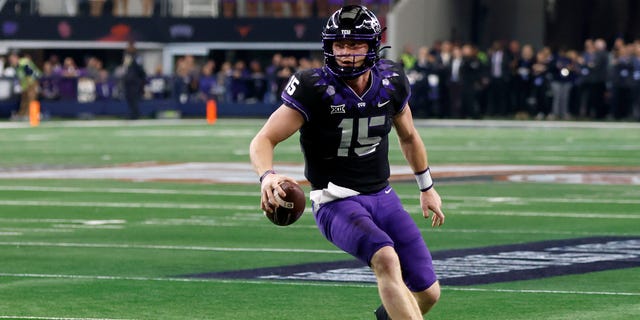 Max Duggan, #15 of the TCU Horned Frogs, carries the ball against the Kansas State Wildcats in the second half of the Big 12 Football Championship at AT&amp;T Stadium on Dec. 3, 2022 in Arlington, Texas. 