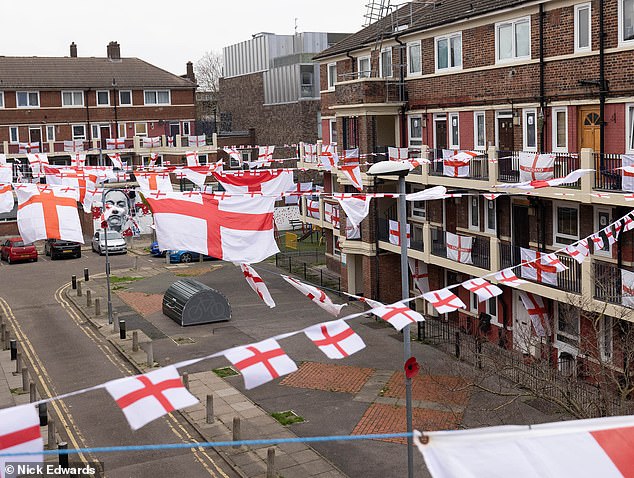 Saint George's Cross flags on display at the Kirby Estate, Bermondsey, ahead of the England vs Senegal football World Cup Clash