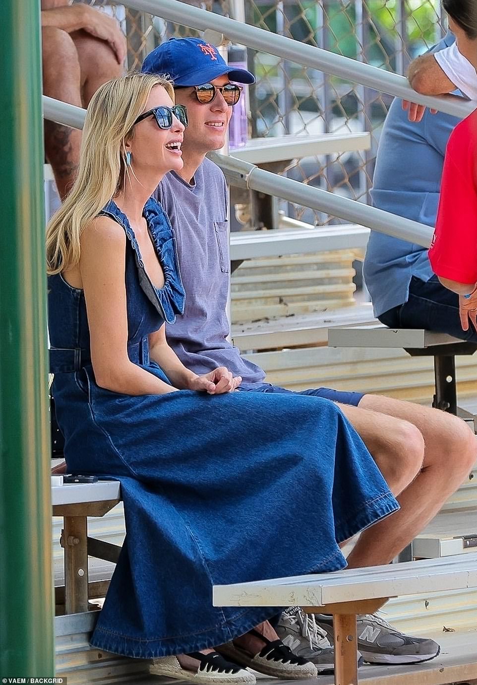 Ivanka and Jared seemed to be enjoying themselves as they chatted with another parent