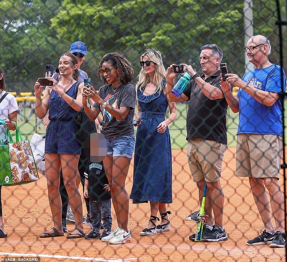 Ivanka and Jared joined the other parents as they took photos of their children's tee-ball team