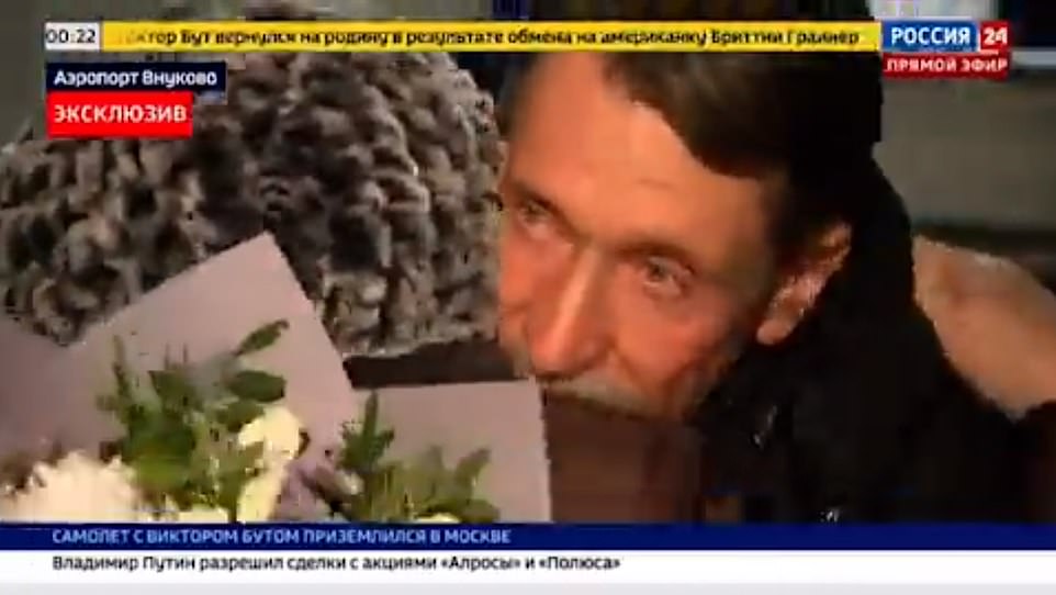 'Merchant of Death' arms dealer Viktor Bout is shown being greeted by his mother after arriving back in Moscow tonight