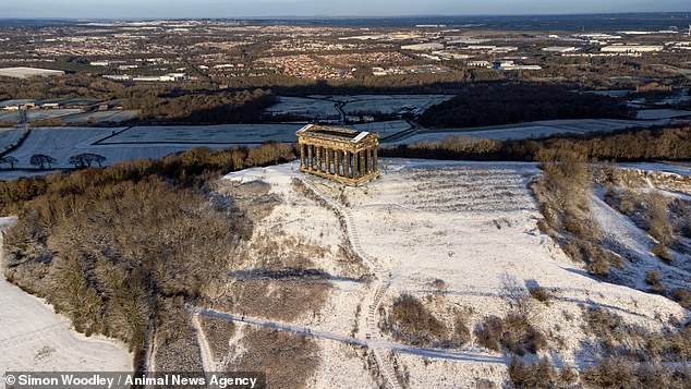 Winter arrives this morning at Penshaw Monument in Sunderland with the first snowfall of the year