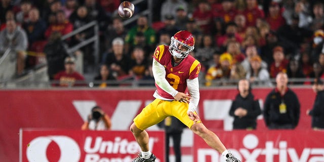 USC Trojans quarterback Caleb Williams throws on the run against the Notre Dame Fighting Irish on Nov. 26, 2022, at Los Angeles Memorial Coliseum.