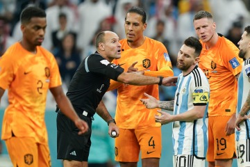 Messi rages at ref as World Cup record SEVENTEEN yellow cards given