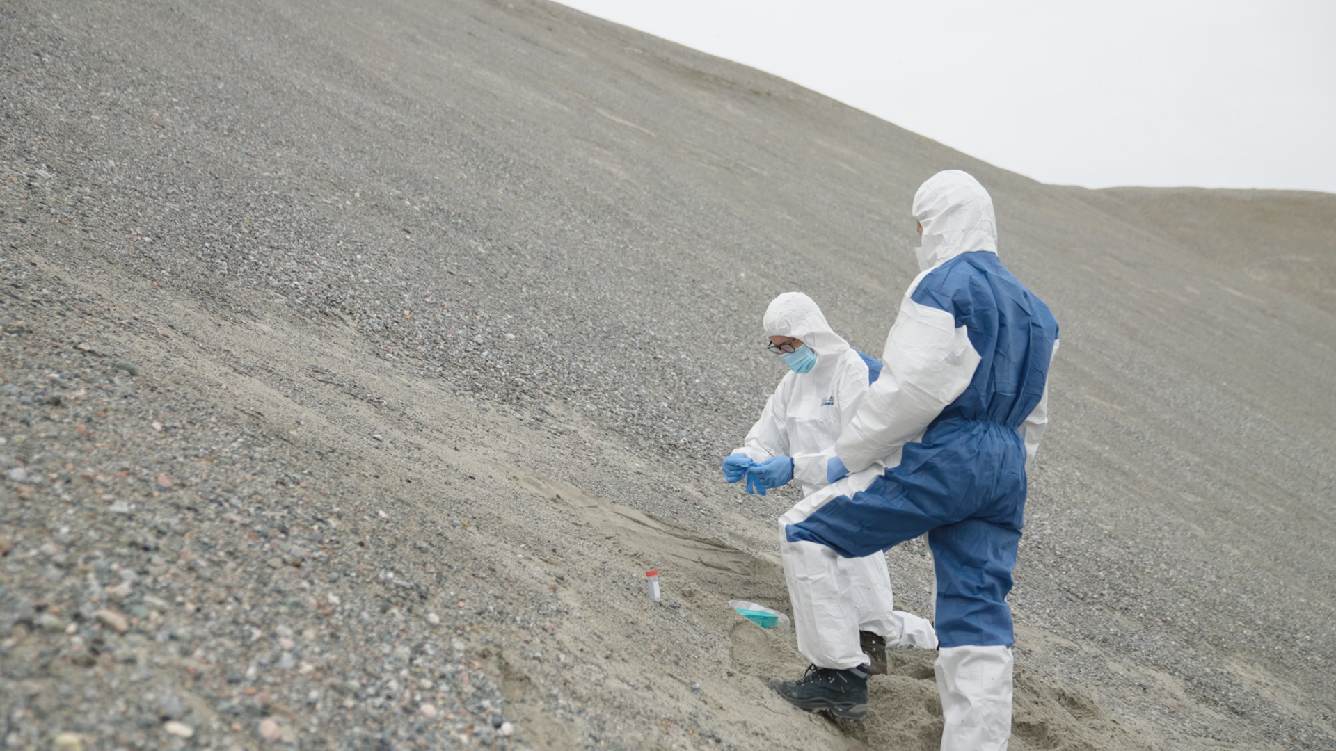 The same area today, as researchers gather samples while avoiding contamination.
