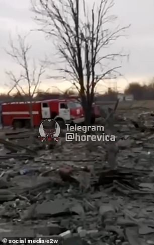 Rubble is strewn across the ground in Russian-occupied Makiivka, in the eastern Donbas region, in the aftermath of the strike. The missiles hit a vocational school which had been turned into a barracks for Russian forces
