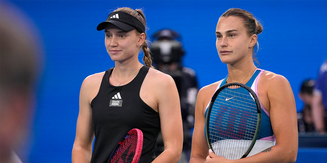 Elena Rybakina, left, and Aryna Sabalenka, pose for a photo ahead of the women's singles final at the Australian Open tennis championship.