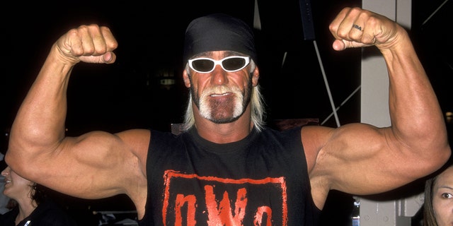 Hulk Hogan wearing an NWO Wolfpac shirt.