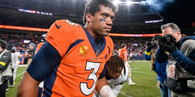 Denver Broncos quarterback Russell Wilson (3) on the field after a win against the Los Angeles Chargers after a game at Empower Field at Mile High on January 8, 2023 in Denver, Colorado. 