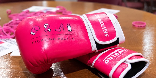 These Fighting Pretty signature pink boxing gloves were customized for breast cancer survivor Carole Seaton.