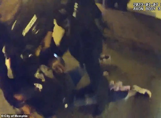 After fleeing towards his mother's house and being tasered by one of the cops, Nichols is tackled and held down by two officers, who repeatedly shout 'give me your hands!'