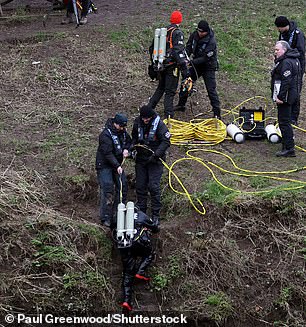 Police divers scoured the river searching for clues