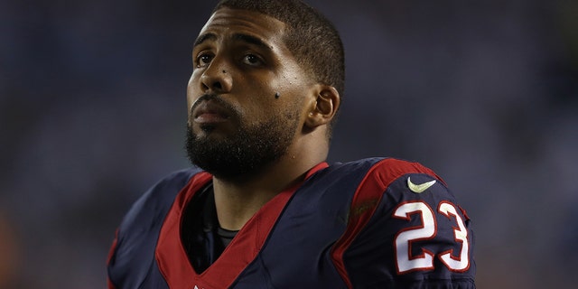 Running back Arian Foster, of the Houston Texans, looks on against the Chargers at Qualcomm Stadium on Sept. 9, 2013, in San Diego.