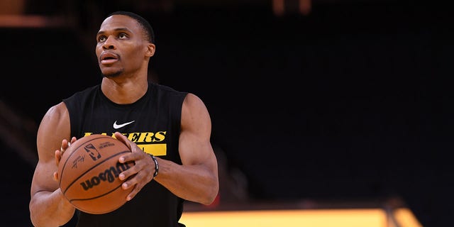 Russell Westbrook of the Los Angeles Lakers warms up before the game against the Golden State Warriors on Oct. 9, 2022, at Chase Center in San Francisco.