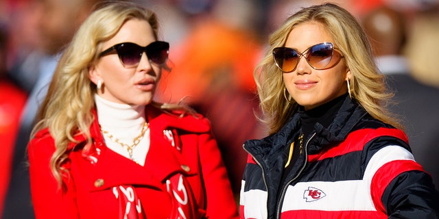 Gracie Hunt, right, the daughter of Kansas City Chiefs owner Clark Hunt, and Tavia Hunt enjoy the sidelines before a game against the Denver Broncos at Empower Field at Mile High on Dec. 11, 2022 in Denver.