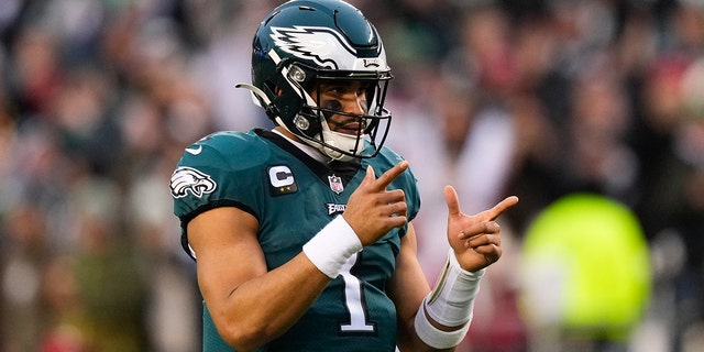 Philadelphia Eagles quarterback Jalen Hurts gestures during the first half of the NFC Championship NFL football game between the Philadelphia Eagles and the San Francisco 49ers on Sunday, Jan. 29, 2023, in Philadelphia. 