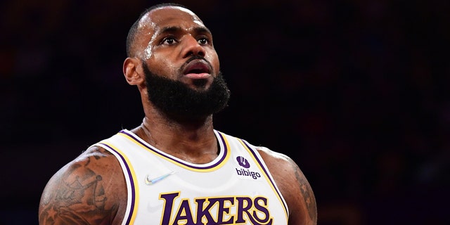 LeBron James of the Los Angeles Lakers shoots a free throw during a game against the Detroit Pistons Nov. 28, 2021, at Staples Center in Los Angeles.