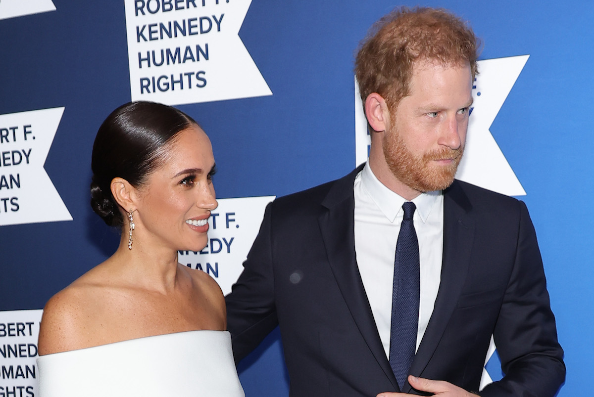 Meghan Markle and Prince Harry, who has reportedly been offered 'incentives' to attend King Charles III's coronation, look on